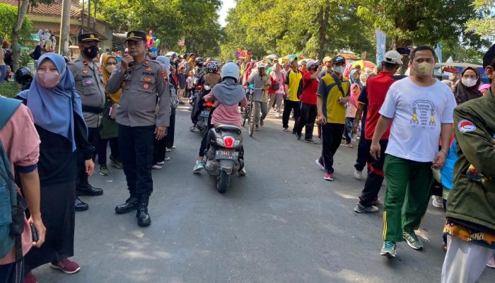 Hari Amal Bakti Kementrian Agama Ke- 77 Polres Tegal Berikan Pengamanan Untuk Peserta Jalan Sehat