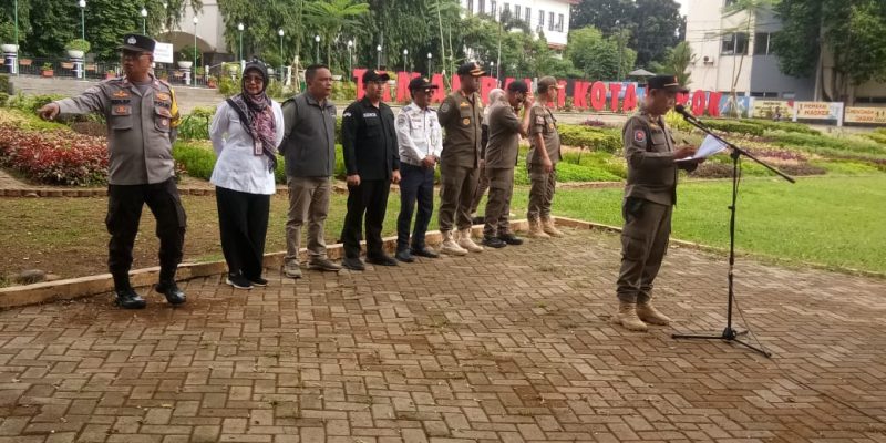 Ketua Panwaslu Kota Depok M.Fathul Arif Tertipkan APK Para Caleg Kota Depok
