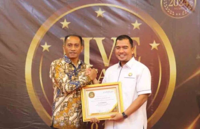 Kapolres Bolmong Arianto Salkery Raih Penghargaan Top Leader Innovation 2024
