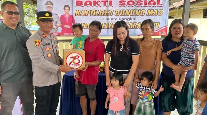 Polsek Manuhing Bersama PT. ALS Salurkan Bansos Makanan Tambahan Untuk Bantu Tangani Stunting
