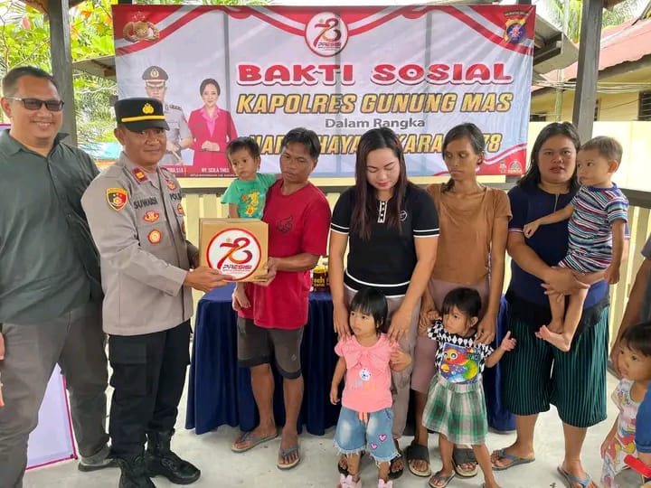 Polsek Manuhing Bersama PT. ALS Salurkan Bansos Makanan Tambahan Untuk Bantu Tangani Stunting