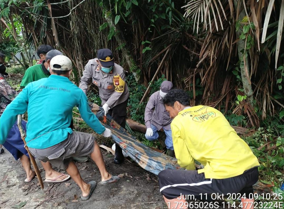 Polsek timpah Laksanakan Kerja Bakti Bersama Warga dalam Rangka World Clean Up Day Tahun 2024,