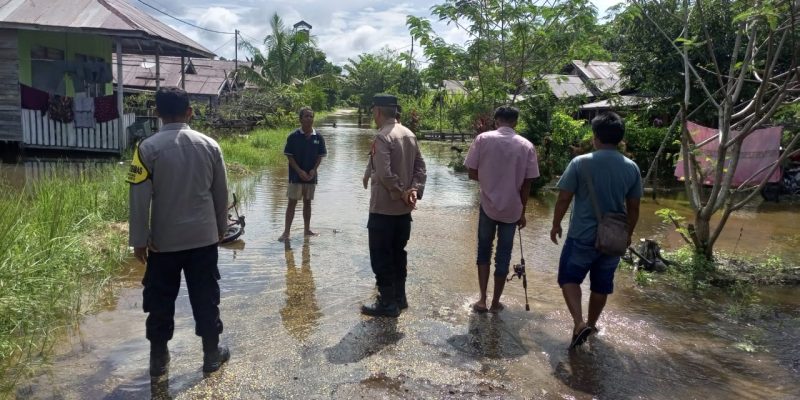 Di Tumbang Tahai, Polsek Bukit Batu Imbau Warga Waspada Genangan Air