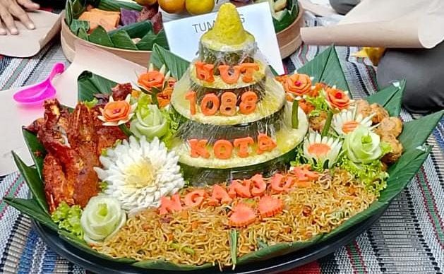 Dinas PPKB Kabupaten Nganjuk Turut Berpartisipasi Gelar Tumpeng Masal peringati Hari Jadi Nganjuk ke 1088